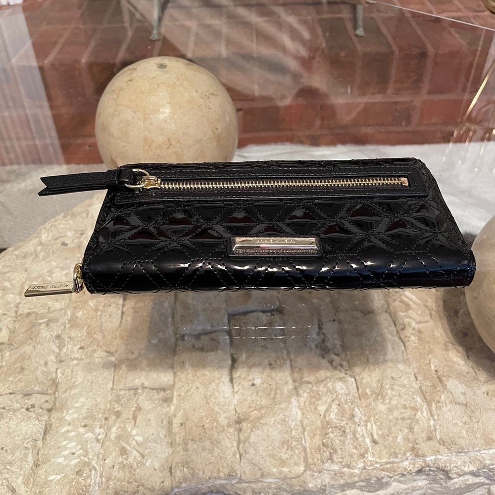 Black faux patent leather Anne Klein wallet.